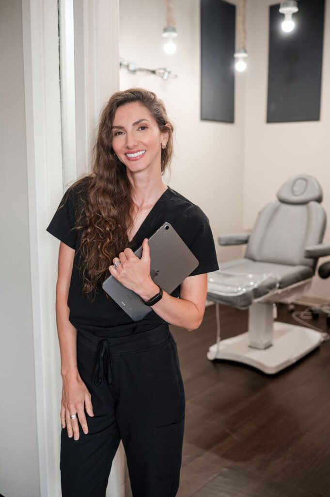 Professional headshot of aesthetic medicine staff member in Columbus